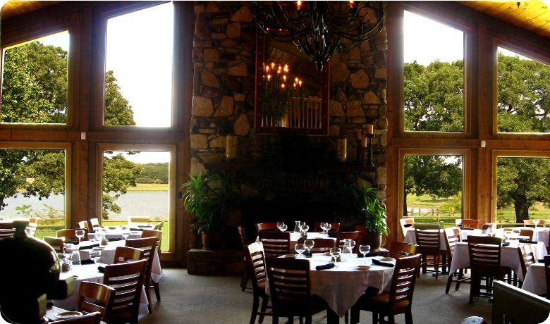 A view of the water and wine from inside of Four Winds Steakhouse.